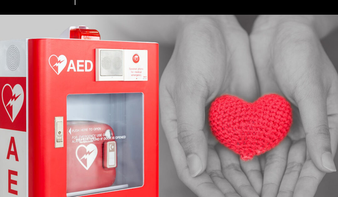 An AED (Automated External Defibrillator) machine, a portable electronic device that can diagnose and treat life-threatening cardiac arrhythmias.