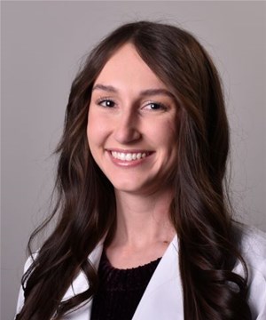 a woman smiling for the camera