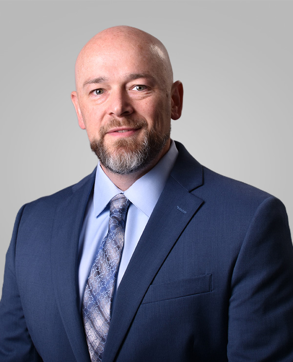 Travis Thatcher-Curtis headshot